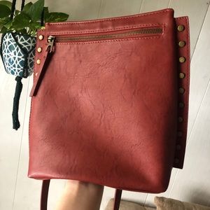 Red crossbody bucket bag